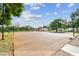 Outdoor basketball court with multiple hoops and plenty of space for a game at 670 Wooddell Dr, Safety Harbor, FL 34695