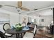 The dining area flows seamlessly into the living room, creating an inviting and functional living space at 670 Wooddell Dr, Safety Harbor, FL 34695