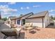 Outdoor brick patio with stylish seating, offering a relaxing space for entertaining guests or enjoying quiet moments at 7004 Westminster St, Tampa, FL 33635