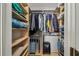 Spacious walk-in closet with ample shelving and hanging space for organized storage at 7004 Westminster St, Tampa, FL 33635