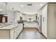 Spacious kitchen with stainless steel appliances, granite countertops, and ample cabinet space at 7004 Westminster St, Tampa, FL 33635