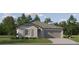 Charming single-story home with a two-car garage and well-maintained landscaping at 7742 Painted Sky Pl, Land O Lakes, FL 34637