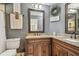 Stylish bathroom showcasing granite countertops, wood cabinetry and decorative fixtures and decor at 8001 Pagoda Dr, Spring Hill, FL 34606