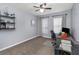 Bedroom offers great natural light, a ceiling fan, and shelving at 8007 Bally Money Rd, Tampa, FL 33610