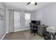 Bedroom with great natural light coming through the windows and curtains at 8007 Bally Money Rd, Tampa, FL 33610