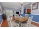 Open dining area with wood floors at 8007 Bally Money Rd, Tampa, FL 33610