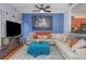 Comfortable living room with a large sectional couch and modern decor at 8007 Bally Money Rd, Tampa, FL 33610