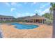 Community pool and covered patio, perfect for hot summer days at 8007 Bally Money Rd, Tampa, FL 33610