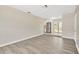 Spacious living room with modern flooring and an open layout at 8314 Stillbrook Ave, Tampa, FL 33615