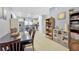 Open dining area connected to the kitchen, complete with elegant seating and tile flooring at 842 Tennyson Mill Cir, Tampa, FL 33619