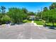 Community pool and parking area, providing residents with a convenient amenity at 842 Tennyson Mill Cir, Tampa, FL 33619