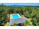 Community pool offering residents a refreshing escape with views of the bay at 842 Tennyson Mill Cir, Tampa, FL 33619