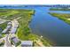 Breathtaking waterfront living with a dock, a community pool, and scenic views at 842 Tennyson Mill Cir, Tampa, FL 33619