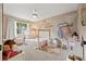 Charming bedroom features a cozy bed frame and adorable decor for a delightful space at 9084 Quail Creek Dr, Tampa, FL 33647