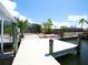 Breathtaking view of the dock, perfect for boating and enjoying waterfront living at 916 Sago Palm Way, Apollo Beach, FL 33572