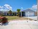 Home exterior with well-maintained lawn and mature landscaping at 916 Sago Palm Way, Apollo Beach, FL 33572