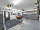 A large garage with ample space for parking and storage, perfect for car enthusiasts at 916 Sago Palm Way, Apollo Beach, FL 33572
