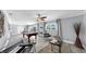 Spacious living room with a pool table and ample seating for entertaining at 916 Sago Palm Way, Apollo Beach, FL 33572