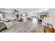 Open living space with comfortable seating and easy access to kitchen and outdoor views at 916 Sago Palm Way, Apollo Beach, FL 33572