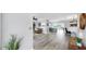 Spacious open concept living space with cohesive design and easy flow throughout at 916 Sago Palm Way, Apollo Beach, FL 33572
