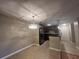 The kitchen features stainless steel appliances, dark cabinets, and pendant lighting at 9481 Highland Oak Dr # 814, Tampa, FL 33647