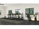 Fitness center featuring treadmills, elliptical machines, and weight-training equipment at 9545 Minnow Ray Dr, Land O Lakes, FL 34638