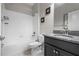 Functional bathroom with a tub and shower combination and a granite vanity at 9931 Victory Gallop Loop, Ruskin, FL 33573