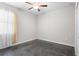 Bedroom featuring a window and polished concrete floor at 9931 Victory Gallop Loop, Ruskin, FL 33573