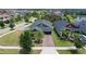 Charming single-story home with a well-maintained front yard, mature landscaping, and a brick driveway at 9931 Victory Gallop Loop, Ruskin, FL 33573