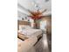 Main bedroom featuring a large mirror, accent wall, and sitting area at 9931 Victory Gallop Loop, Ruskin, FL 33573