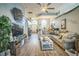 Spacious living room with high ceilings, modern flooring, and comfortable seating area for gatherings at 1007 English Bluffs Ct, Brandon, FL 33511