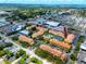 Aerial view showcases the complex, surrounded by lush greenery, and its convenient location at 10764 70Th Ave # 5302, Seminole, FL 33772