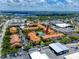 Aerial view of the complex highlighting the pool, tennis court, proximity to retail and the intercoastal at 10764 70Th Ave # 5302, Seminole, FL 33772