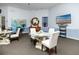 Bright conference room with modern furnishings, ideal for meetings, and a calming atmosphere at 10764 70Th Ave # 5302, Seminole, FL 33772