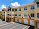 Condo complex with garages on the ground level and residential units above at 10764 70Th Ave # 5302, Seminole, FL 33772
