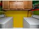 Laundry room features new washer and dryer, along with cabinet storage at 10764 70Th Ave # 5302, Seminole, FL 33772
