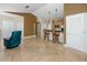 Spacious living room boasting tile floors, breakfast bar, and stylish furnishings at 10764 70Th Ave # 5302, Seminole, FL 33772