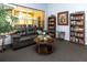 Cozy lounge area with comfortable seating and bookshelves, ideal for reading and relaxation at 10764 70Th Ave # 5302, Seminole, FL 33772