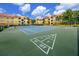 View of community tennis and shuffleboard courts in a meticulously maintained complex at 10764 70Th Ave # 5302, Seminole, FL 33772