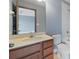 Bathroom with a large vanity and ample storage space, as well as a shower and bathtub at 11006 Tahiti Isle Ln, Tampa, FL 33647