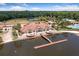 Stunning waterfront clubhouse with private dock access and lush landscaping at 11006 Tahiti Isle Ln, Tampa, FL 33647