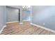 This charming living room features hardwood floors and recessed lighting at 11006 Tahiti Isle Ln, Tampa, FL 33647