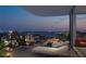Expansive balcony with comfortable lounge furniture, offering breathtaking nighttime city views at 1101 E Jackson St # 2302, Tampa, FL 33602