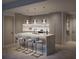 Modern kitchen with marble countertops, island with seating, and stainless steel appliances at 1101 E Jackson St # 2302, Tampa, FL 33602