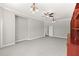 Large bonus room with neutral walls and carpet and ample space for furniture and activities at 1171 Red Maple Ne Cir, St Petersburg, FL 33703