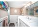 Bright bathroom with fresh vanity, stylish decor, and a glass-enclosed shower at 12300 Park Blvd # 222, Seminole, FL 33772