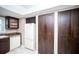Kitchen features, stainless steel appliances, dark cabinetry, and ample storage space at 12300 Park Blvd # 222, Seminole, FL 33772