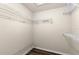 This walk-in closet features wire shelving and hardwood floors at 12339 Roseland Dr, New Port Richey, FL 34654