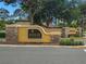 Inviting community entrance sign with stone accents and professional landscaping at 12339 Roseland Dr, New Port Richey, FL 34654