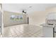 Living room with tile floors and views of the water at 12339 Roseland Dr, New Port Richey, FL 34654